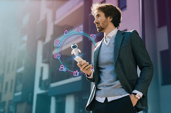 low-angle-view-businessman-using-mobile-phone-while-standing-street-looking-awayjpg (1)